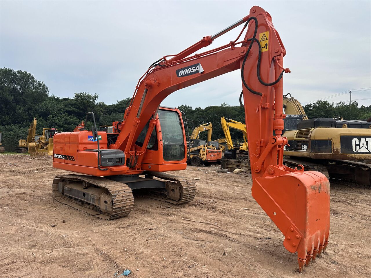 Doosan DX120 - Гусеничный экскаватор: фото 5 Doosan DX120 - Гусеничный экскаватор: фото 5