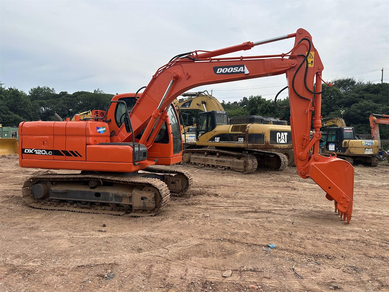 Doosan DX120 - Гусеничный экскаватор: фото 2 Doosan DX120 - Гусеничный экскаватор: фото 2