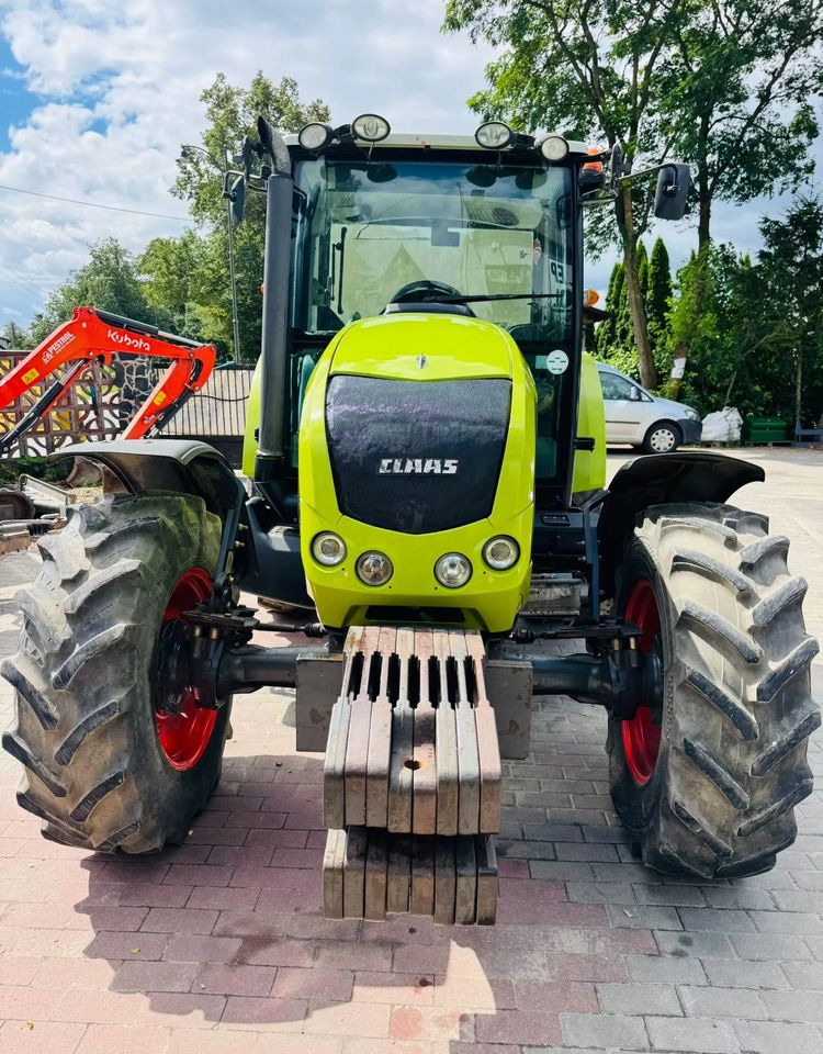 Claas Axos 330 - Трактор: фото 2 Claas Axos 330 - Трактор: фото 2
