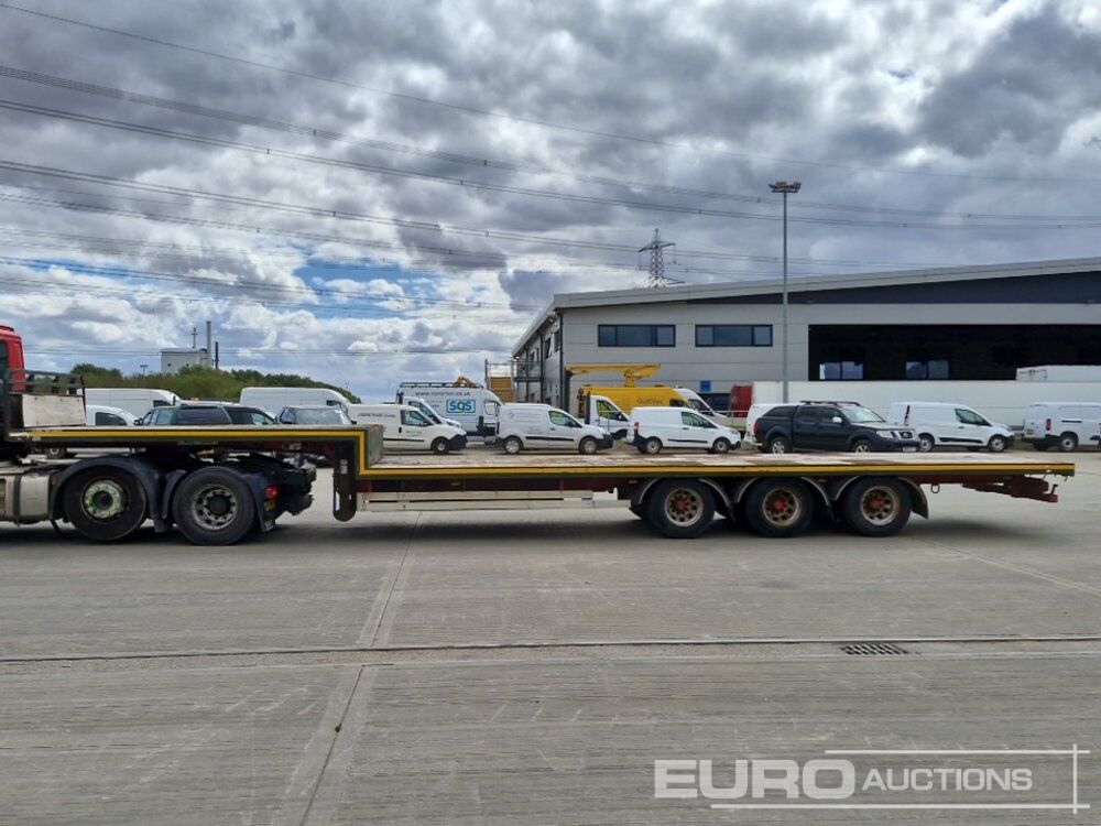 2000 SDC Trailer Tri Axle Stepframe Flat Bed Trailer - Полуприцеп бортовой/ Платформа: фото 2 2000 SDC Trailer Tri Axle Stepframe Flat Bed Trailer - Полуприцеп бортовой/ Платформа: фото 2