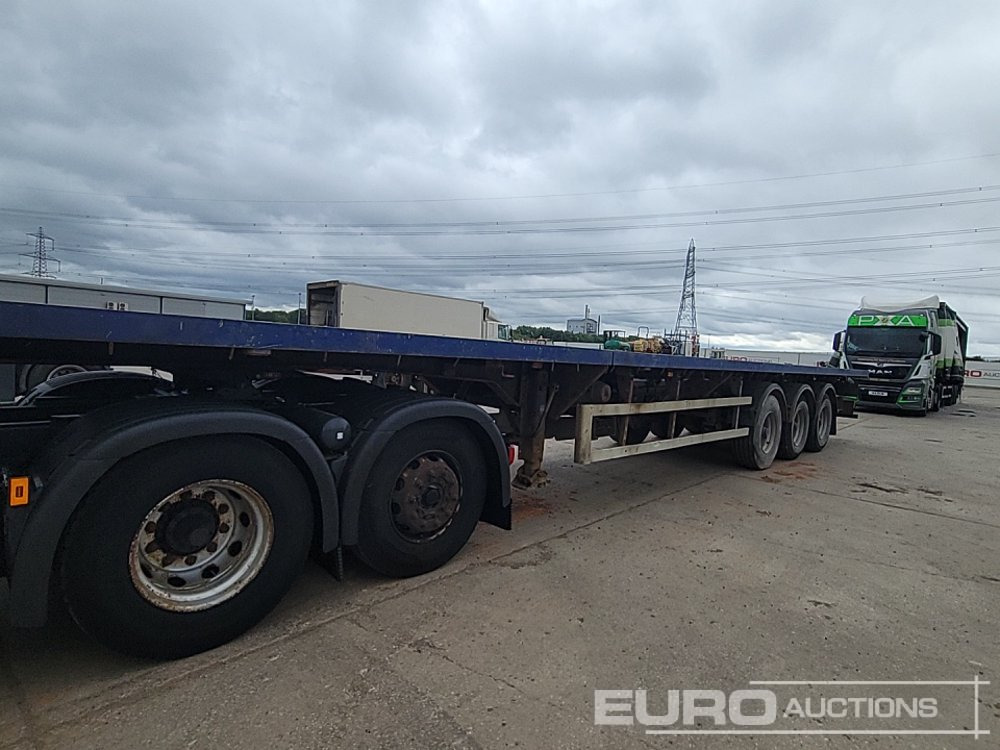 2007 SDC Trailer Tri Axle Extendable Flatbed Trailer, Twist Locks, Rear Steer - Полуприцеп бортовой/ Платформа: фото 1 2007 SDC Trailer Tri Axle Extendable Flatbed Trailer, Twist Locks, Rear Steer - Полуприцеп бортовой/ Платформа: фото 1