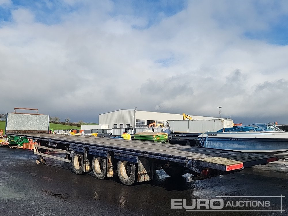 45' Tri Axle Flat Trailer - Полуприцеп бортовой/ Платформа: фото 2 45' Tri Axle Flat Trailer - Полуприцеп бортовой/ Платформа: фото 2