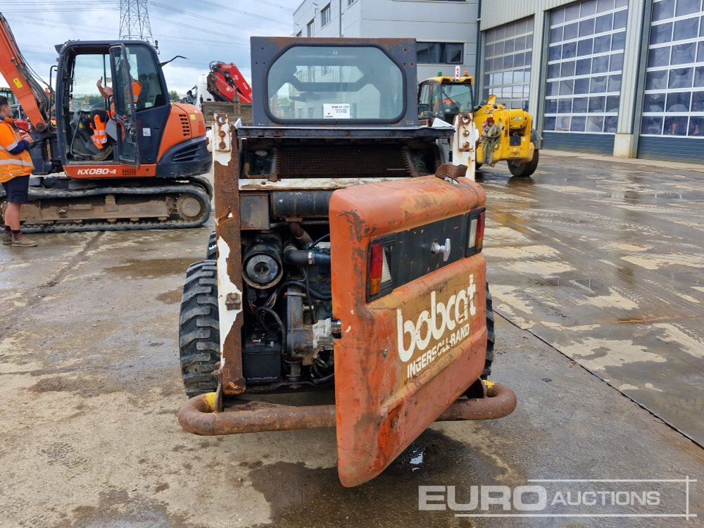 Bobcat 763 - Мини-погрузчик с бортовым поворотом: фото 4 Bobcat 763 - Мини-погрузчик с бортовым поворотом: фото 4