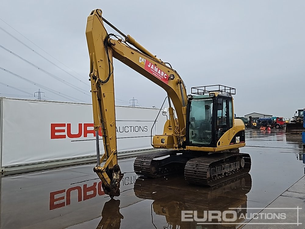 CAT 312C - Гусеничный экскаватор: фото 1 CAT 312C - Гусеничный экскаватор: фото 1