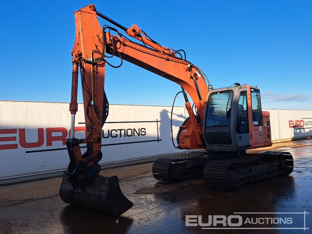 Hitachi ZX135US - Гусеничный экскаватор: фото 1 Hitachi ZX135US - Гусеничный экскаватор: фото 1