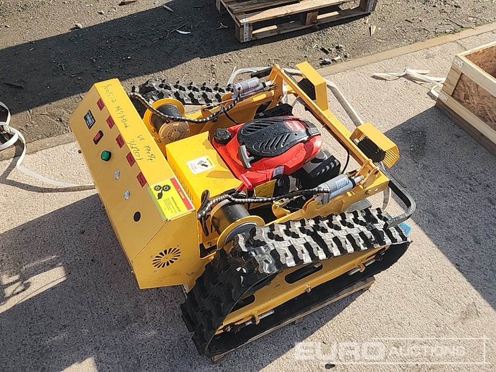 Unused Tracked Remote Control Lawnmower (Remote Control in Office) - Газонокосилка: фото 1 Unused Tracked Remote Control Lawnmower (Remote Control in Office) - Газонокосилка: фото 1