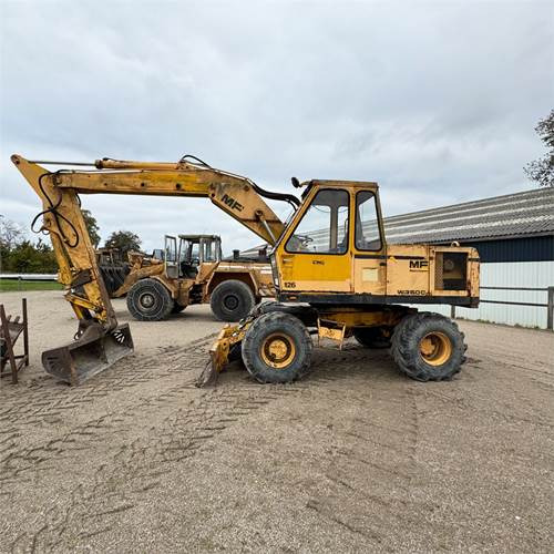 Massey Ferguson W350 C - Колёсный экскаватор: фото 1 Massey Ferguson W350 C - Колёсный экскаватор: фото 1