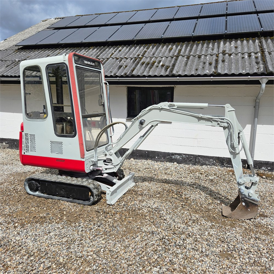 Takeuchi TB015 - Мини-экскаватор: фото 1 Takeuchi TB015 - Мини-экскаватор: фото 1