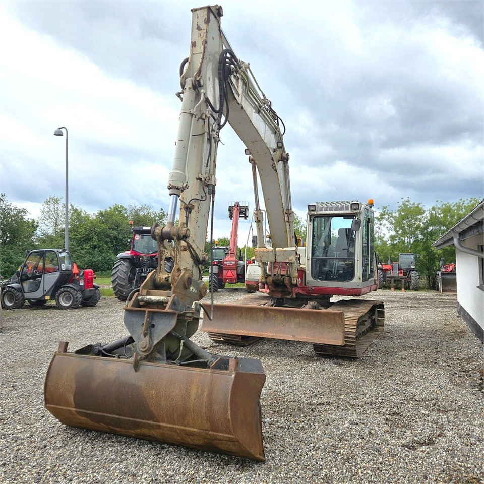 Takeuchi TB1140 - Гусеничный экскаватор: фото 4 Takeuchi TB1140 - Гусеничный экскаватор: фото 4