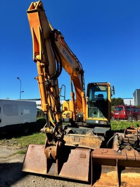 Hyundai ROBEX 140W-9 - Колёсный экскаватор: фото 2 Hyundai ROBEX 140W-9 - Колёсный экскаватор: фото 2