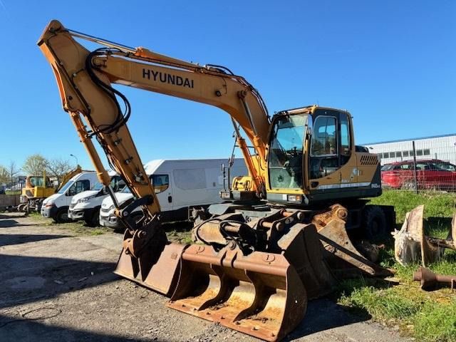 Hyundai ROBEX 140W-9 - Колёсный экскаватор: фото 1 Hyundai ROBEX 140W-9 - Колёсный экскаватор: фото 1