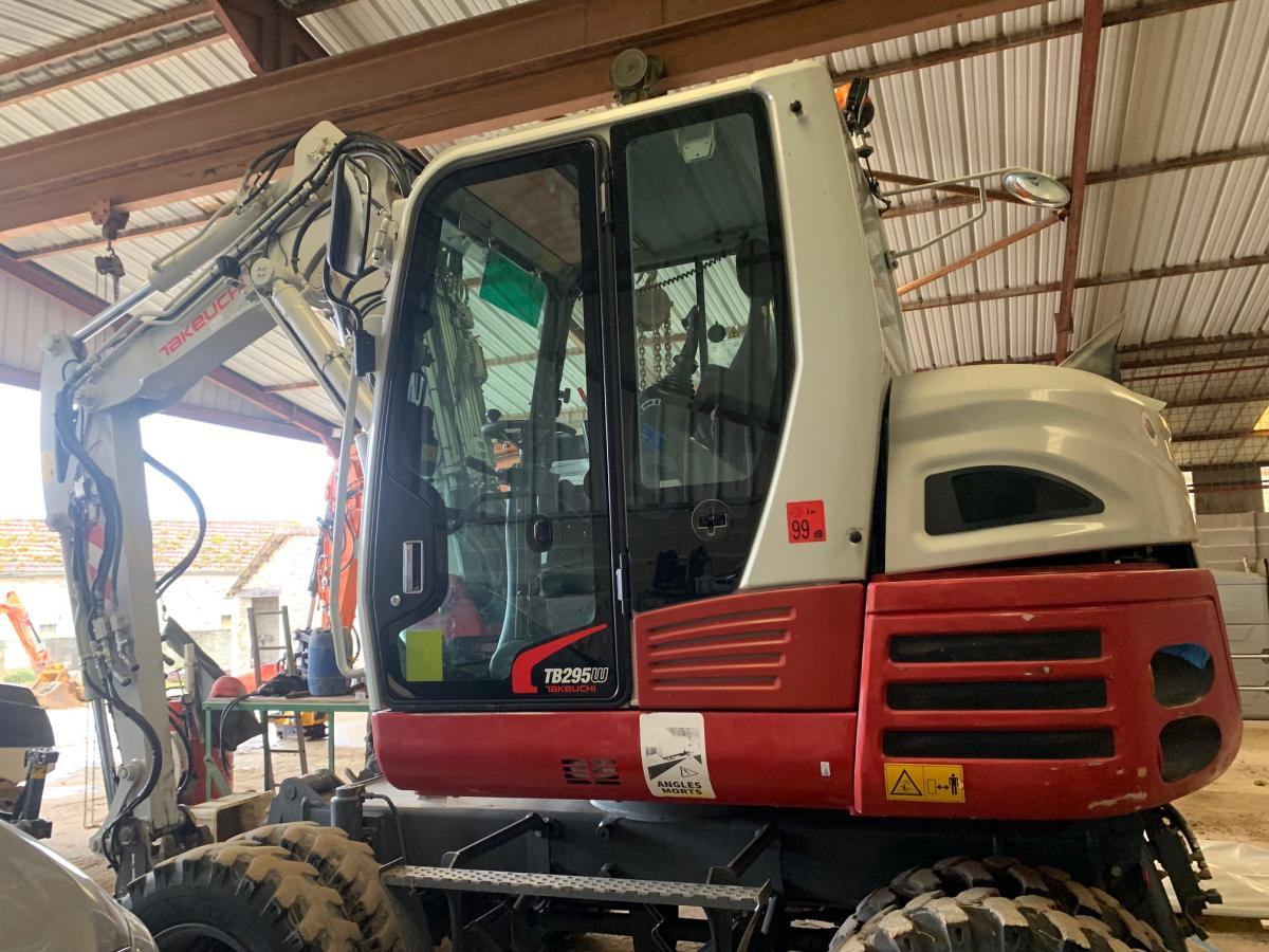Takeuchi TB 295W - Колёсный экскаватор: фото 1 Takeuchi TB 295W - Колёсный экскаватор: фото 1