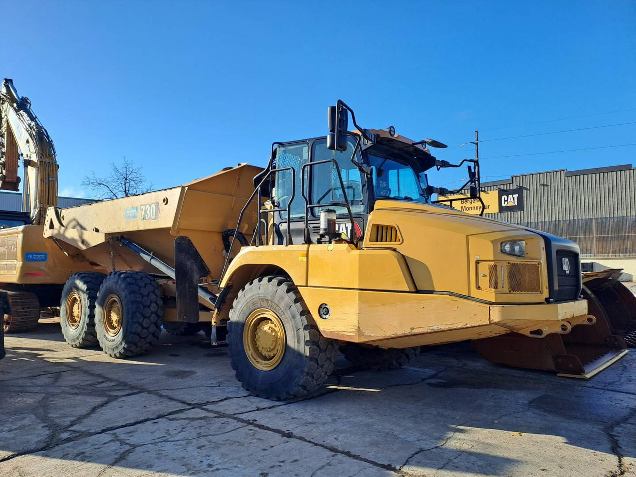 CAT 730 - Сочленённый самосвал: фото 1 CAT 730 - Сочленённый самосвал: фото 1