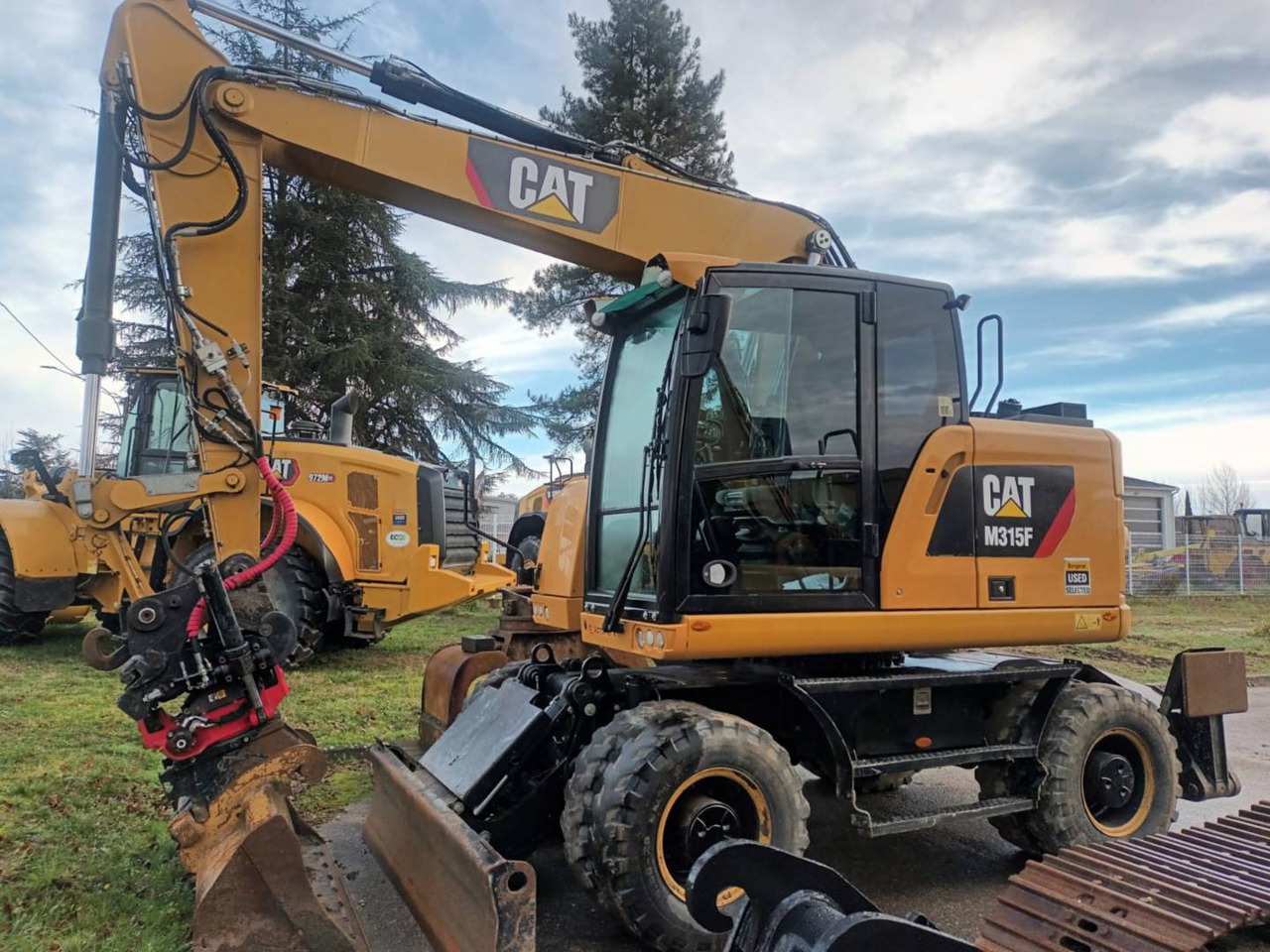 CAT M315F IVC - Колёсный экскаватор: фото 1 CAT M315F IVC - Колёсный экскаватор: фото 1