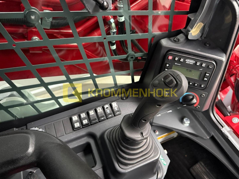 Новый Мини-погрузчик с бортовым поворотом Takeuchi TL 12 V-2: фото 14 Новый Мини-погрузчик с бортовым поворотом Takeuchi TL 12 V-2: фото 14