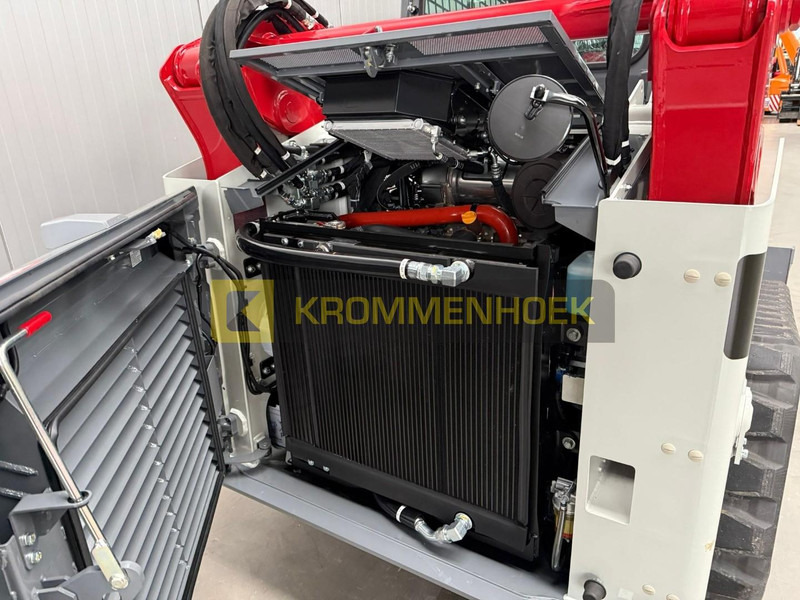Новый Мини-погрузчик с бортовым поворотом Takeuchi TL 12 V-2: фото 17 Новый Мини-погрузчик с бортовым поворотом Takeuchi TL 12 V-2: фото 17