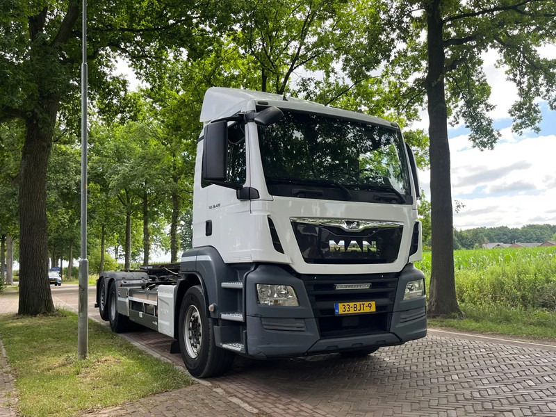 MAN TGS 26.420 container systeem met kabels - Грузовик-контейнеровоз/ Сменный кузов: фото 1 MAN TGS 26.420 container systeem met kabels - Грузовик-контейнеровоз/ Сменный кузов: фото 1