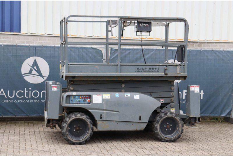 Haulotte Compact 12DX - Ножничный подъемник: фото 1 Haulotte Compact 12DX - Ножничный подъемник: фото 1