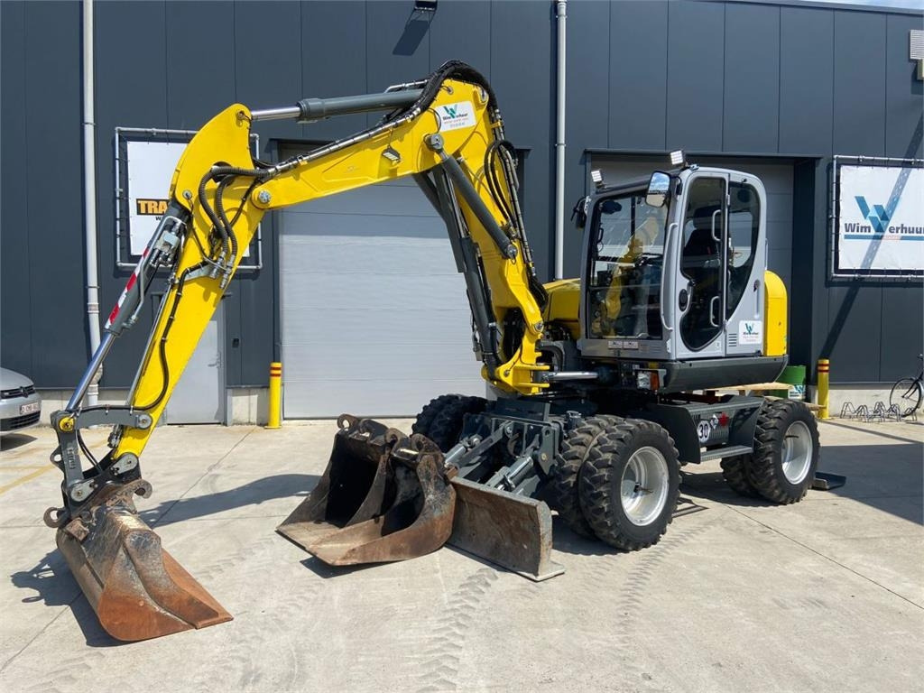 Wacker Neuson EW100 (7057) - Колёсный экскаватор: фото 1 Wacker Neuson EW100 (7057) - Колёсный экскаватор: фото 1